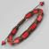 Плетеный браслет в стиле Шамбала Everiot Select LNS-2056 из красных керамических бусин